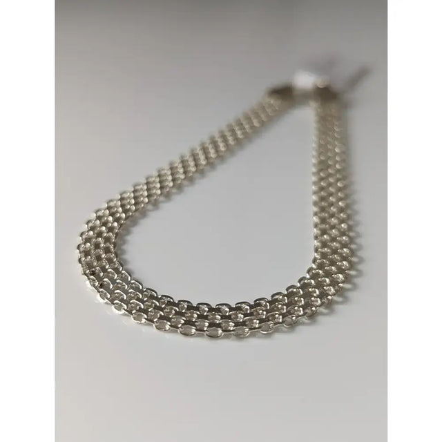 Silver steed interlink silver bracelet with polished silver-toned multi-strand interlink chain design