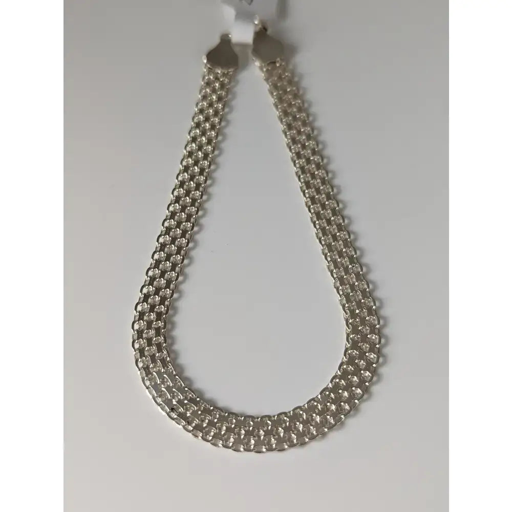 Silver steed interlink silver bracelet with silver-toned multi-strand chain and textured interlocking link design