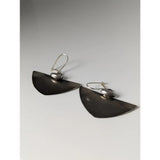 Silver steed isosceles dropped earrings featuring silver-toned matte semi-circles with small oval accents