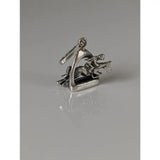 Silver steed jump over a stirrup jockey silver pendant in polished silver showing an equestrian jump scene