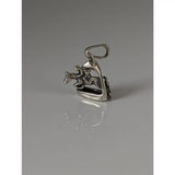 Silver steed jump silver jockey pendant with polished metallic finish and detailed equestrian figure mid-jump over stirrup