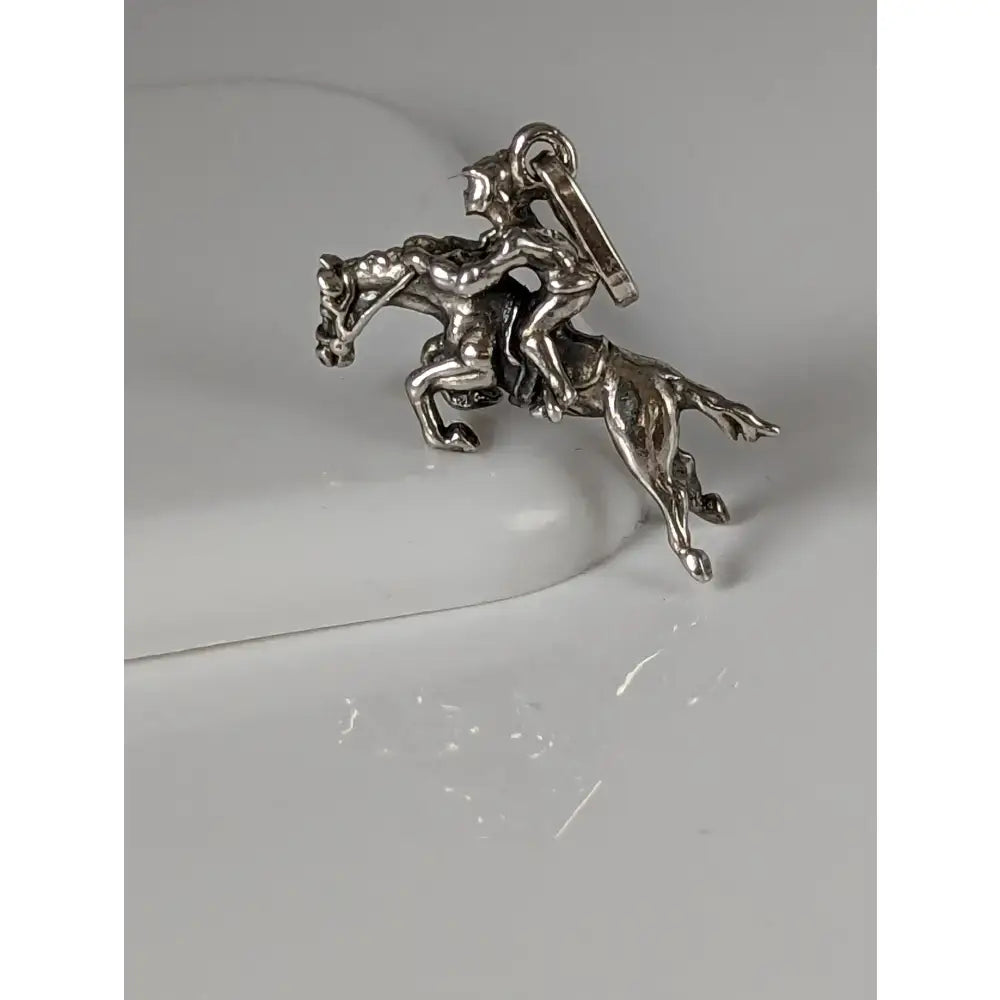 Silver steed jumping jockey silver pendant with detailed sculpted design of horse and rider charm in silver