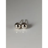 Silver steed large sterling silver ball stud earrings with polished reflective spherical heads and slender posts