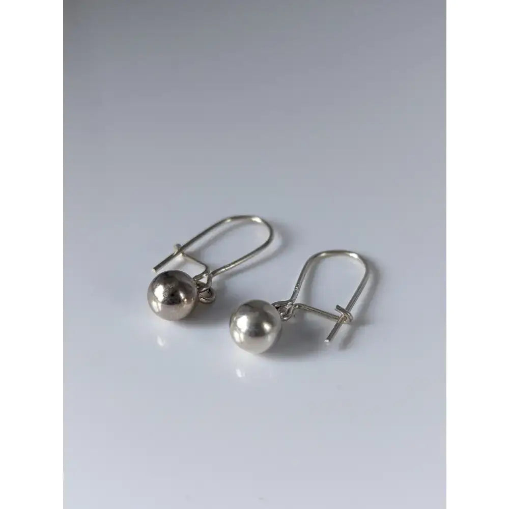 Silver steed large silver balls dropped earrings with simple hook clasps in equestrian style