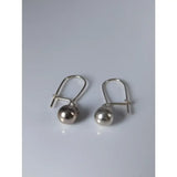 Silver steed large balls dropped earrings in silver with a simple minimalist equestrian style design