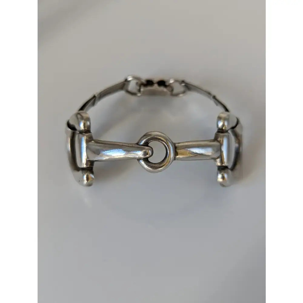 Silver steed large silver horsebit style bangle with sterling silver polished links and a robust design ring centerpiece
