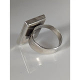 Silver steed large frame silver ring with a silver-toned rectangular textured face and smooth band featuring large unique rose details