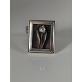 Silver steed large silver ring with a raised tulip design and pearl center in a minimalist frame silver ring