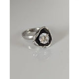 Silver steed large flower silver ring with a round clear zirconia in a textured blackened metal setting for equestrian jewelry