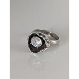 Silver steed large flower silver ring with textured organic setting holding round-cut clear zirconia gemstone equestrian jewelry