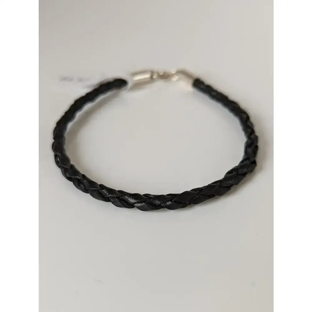 Silver steed leather cord bracelet with black braided leather and a silver-toned clasp for stylish wear