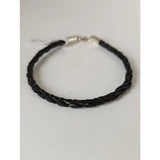 Silver steed leather cord bracelet with black braided leather and a silver-toned clasp for stylish wear