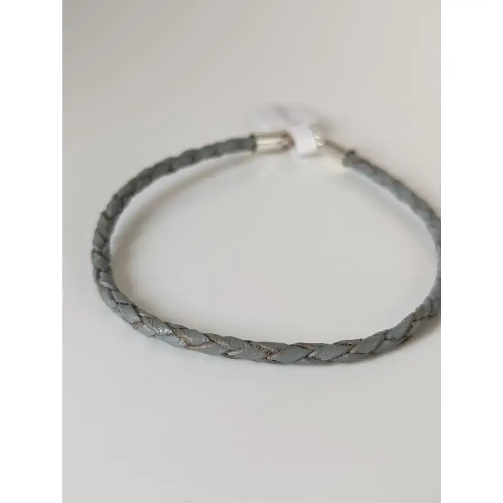 Gray braided leather cord bracelet with silver toned magnetic clasp from silver steed leather collection
