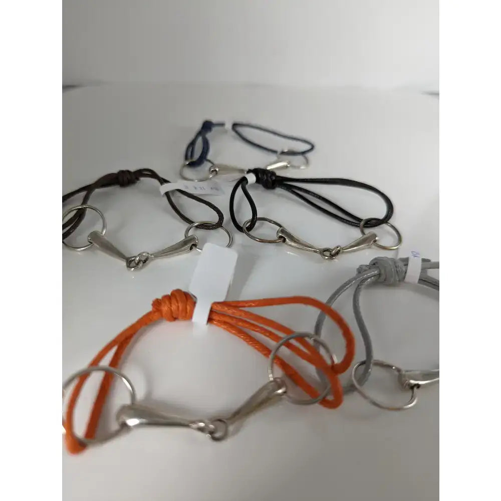 Orange braided leather silver steed leather snaffle cord bracelet with a silver horsebit charm