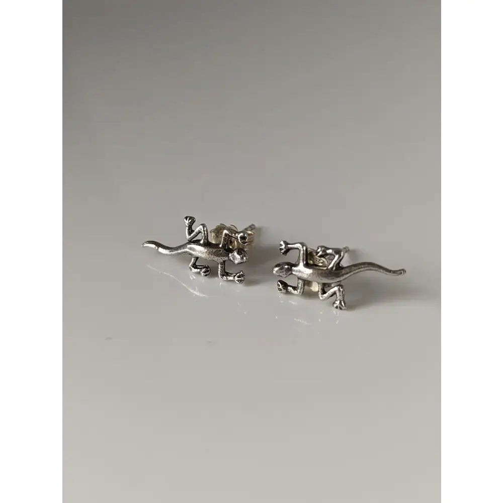 Silver steed lizard stud earrings featuring detailed silver limbs and tails perfect for equestrian jewelry lovers