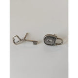 Silver steed lock and key stud earrings featuring silver key stud earrings with intricate detailing