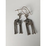 Silver steed long silver cat earrings with slender stylized design and simple wire hooks for cat lovers