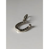 Silver steed lucky horseshoe silver pendant with small round studs in sterling silver and loop for attachment