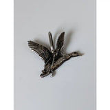 Silver steed malard high-polished silver pendant shaped like a detailed silver-colored metal duck with a top loop
