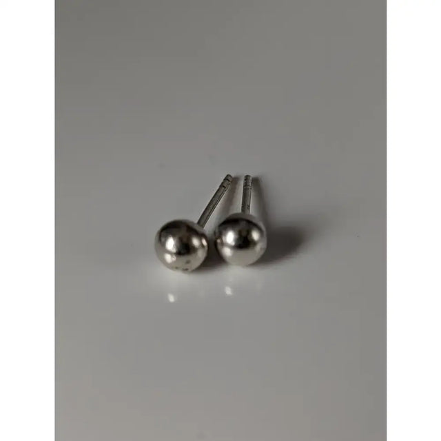 Silver steed medium silver ball stud earrings with sleek polished metallic spheres and slender posts