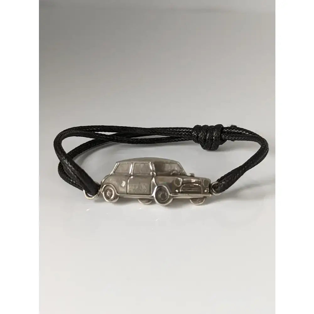 Black cord mini cooper bracelet with silver steed mini car charm in sterling silver and black cord