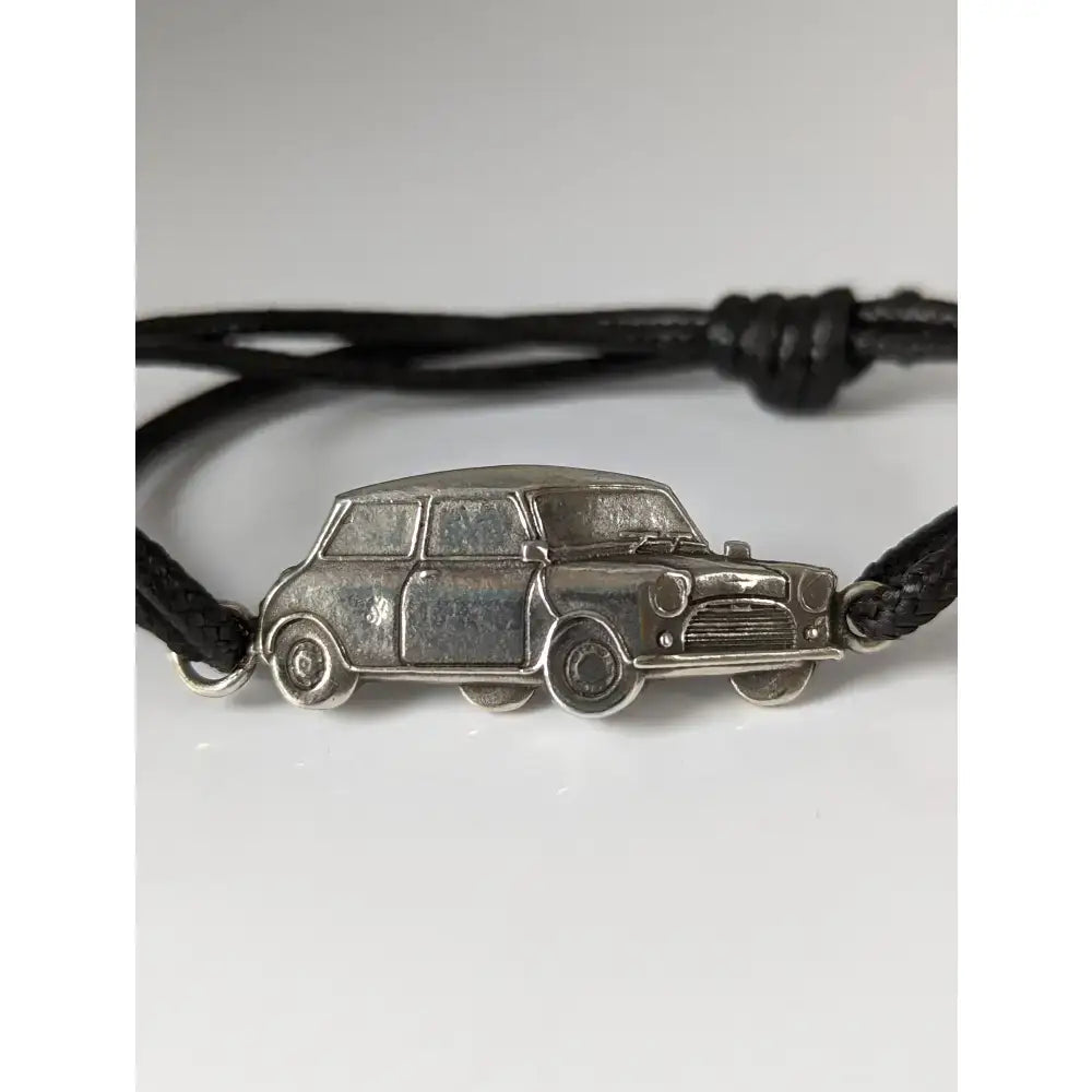 Black leather cord sterling silver black cord mini cooper bracelet with detailed silver steed mini classic car charm