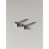 A pair of silver steed mouse stud earrings with tiny detailed miniature dachshund figures in silver sterling