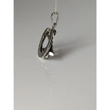 Silver steed oak horseshoe silver pendant featuring a silver-toned metal with interlocking rings and small stones