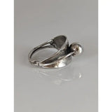 Silver steed round bud ring with a textured silver-toned sculptural band and a polished spherical accent