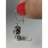 Silver steed oranges dropped earrings featuring handcrafted silver apple design with polished finish and leaf detail