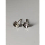 Silver steed pansy stud earrings with dainty pansy motifs and a polished silver flower-shaped design