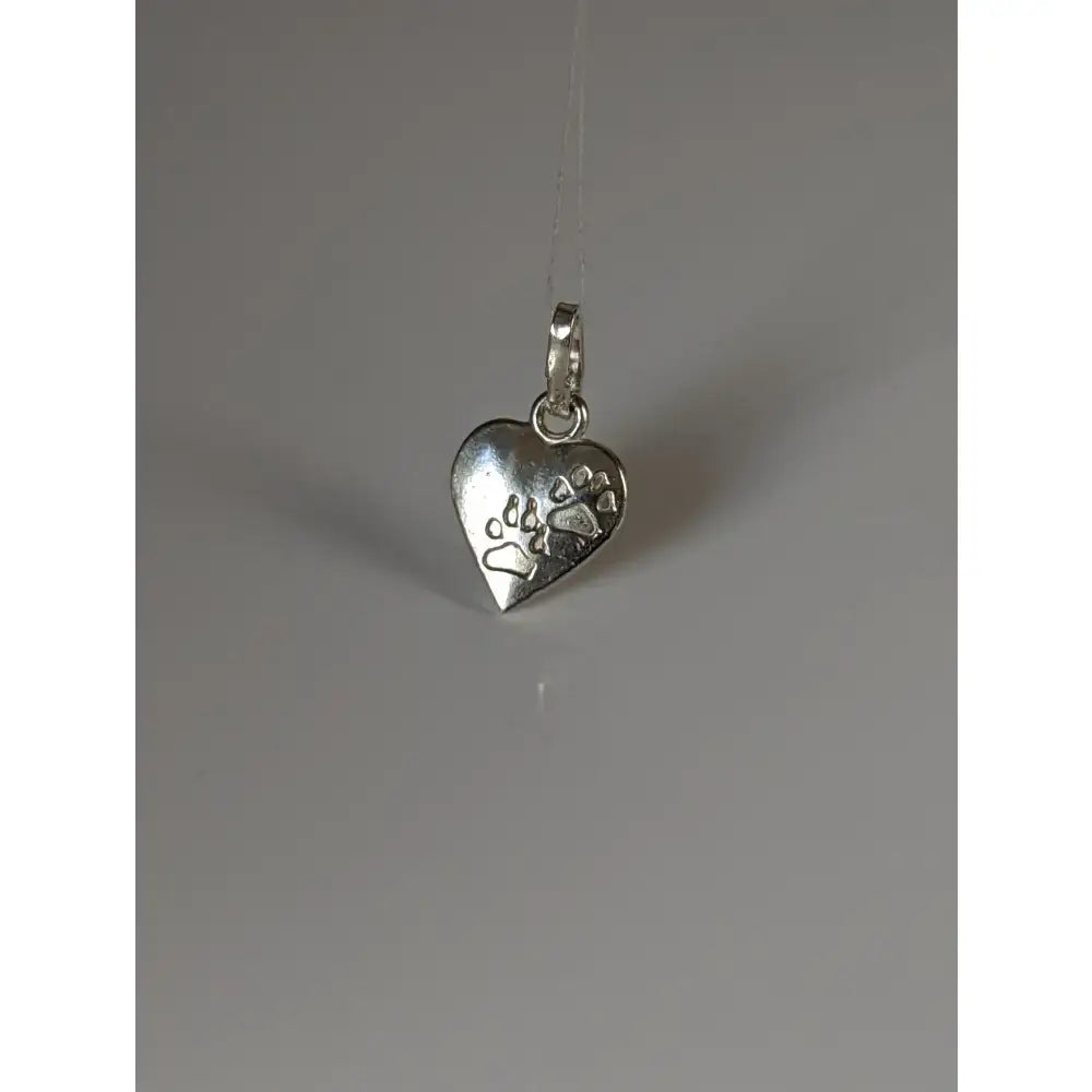 Silver steed heart silver pendant with engraved paw prints in silver, perfect for pet lovers