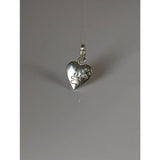 Silver steed heart silver pendant with engraved paw prints in silver, perfect for pet lovers
