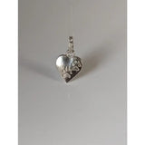 Silver pendant heart silver steed design with engraved paw prints in a shiny silver heart-shaped pendant