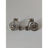 Silver steed penny farthing bike stud earrings featuring intricate detailing on wheels and frame in silver tone