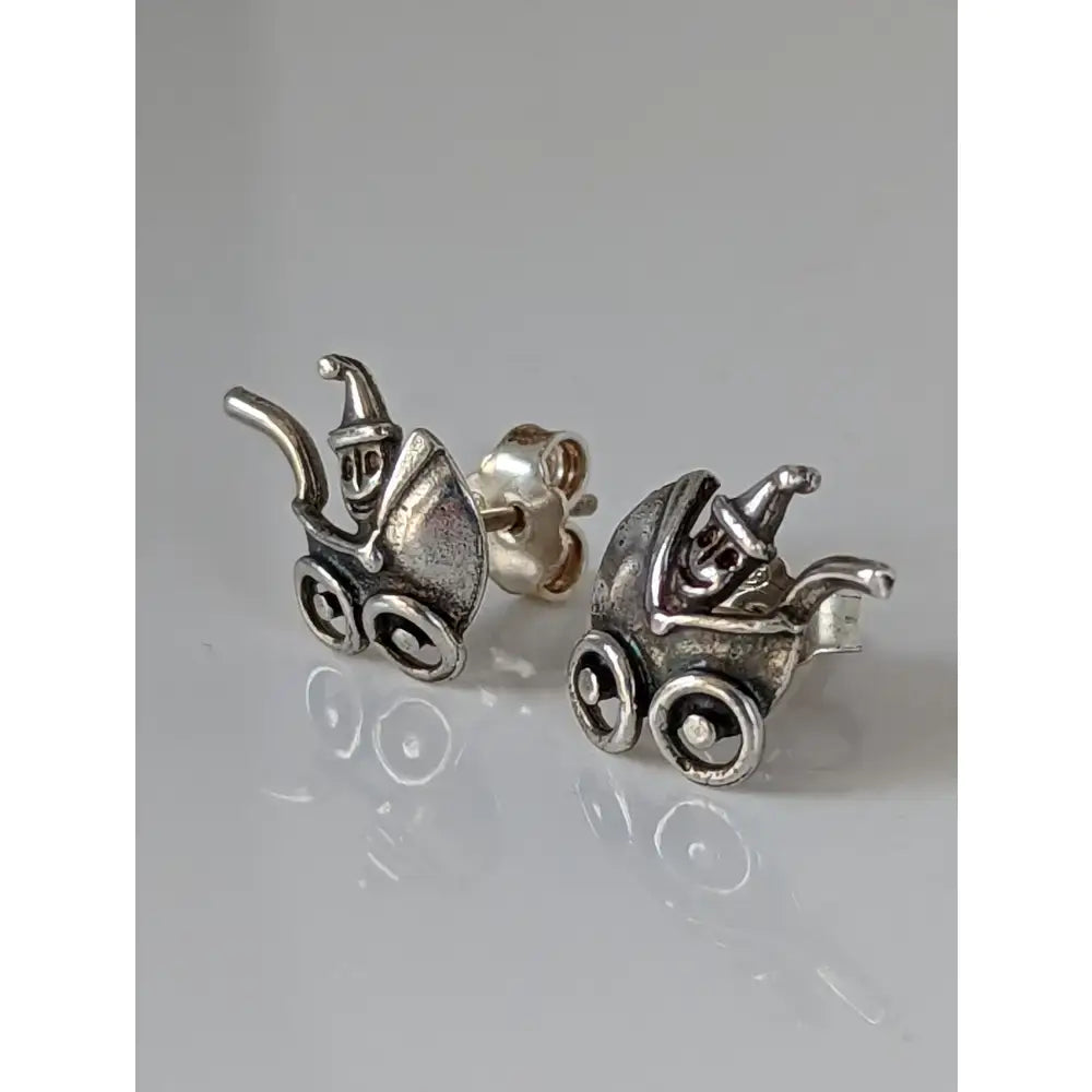 Silver steed pram stud earrings featuring sterling silver whimsical carriage shape with tiny wheels and driver figure