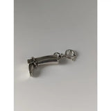Silver charm shaped like a riding boot with buckle detail in silver steed riding boot silver design
