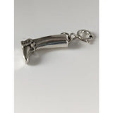 Silver charm shaped like a miniature nail clipper with polished finish and attached to a small chain for riding boot silver collection