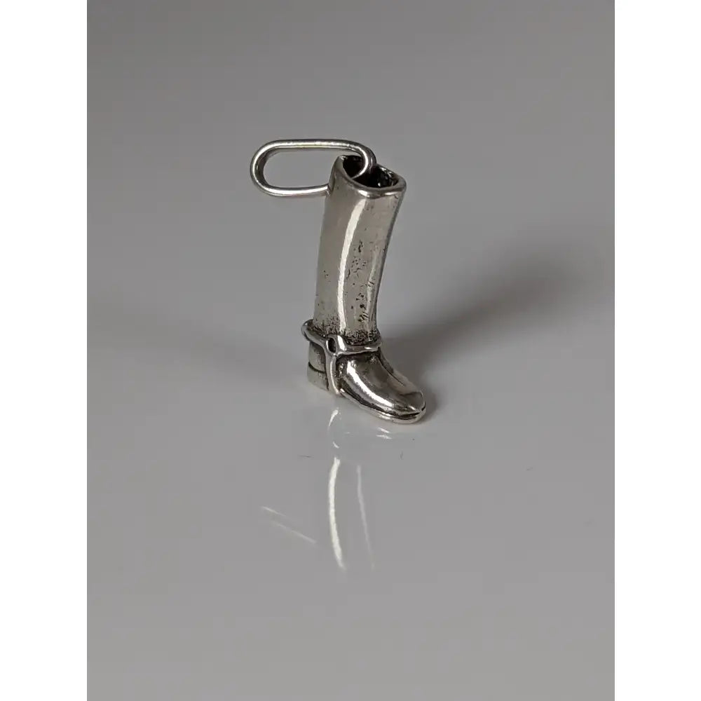 Silver steed riding boot pendant in silver with polished finish and detailed stitching for high polished chain use