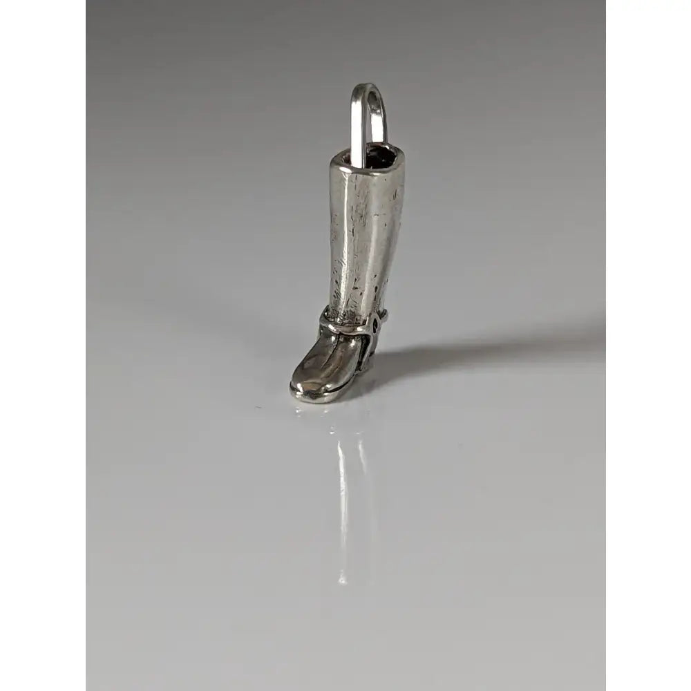 Silver steed riding boot pendant in silver metal with polished finish and detailed stitching for high polished chain