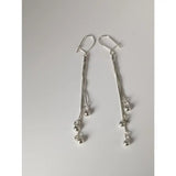 Silver steed rope ball dropped earrings with delicate silver chains and small beads for stylish dropped earrings look