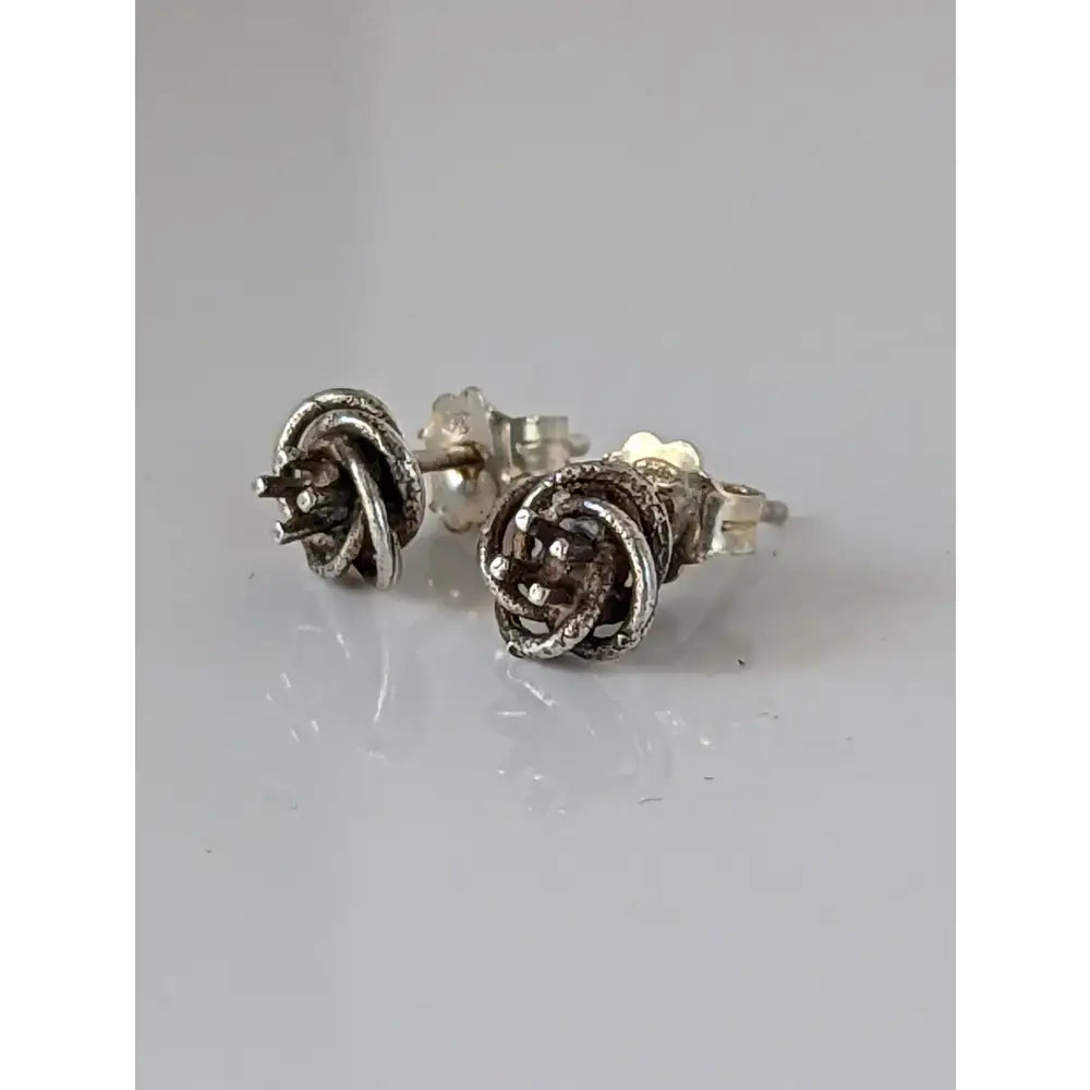 Silver steed rope flower stud earrings with textured twisted silver knot design perfect as flower stud earrings