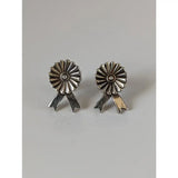 Silver steed rosette stud earrings with silver ribbon sunburst design and textured metallic finish