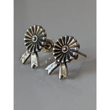 Silver steed rosette stud earrings with silver ribbon-themed sunburst design and textured metallic finish