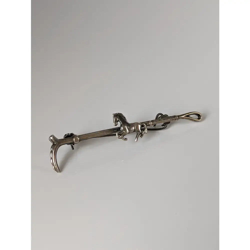 Silver steed running silver horse and riding whip tie clip with intricate detailing and polished metallic finish brooch stock tie