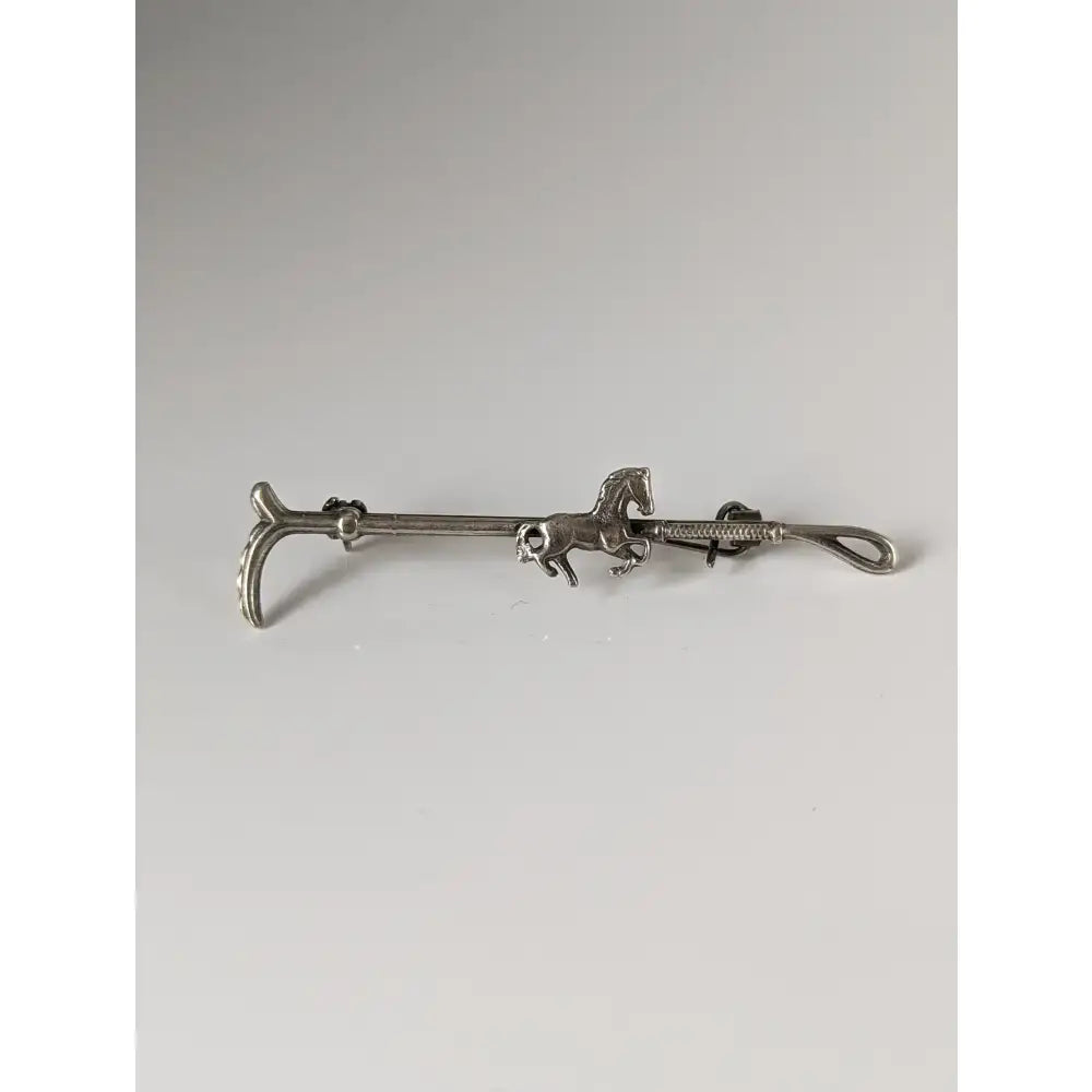 Silver steed running horse brooch tie bar with intricate detailing and polished silver metallic finish for stock tie use