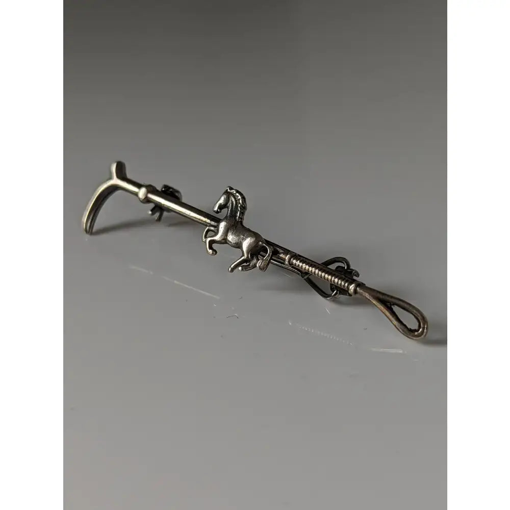 Silver steed running horse brooch with intricate metalwork in silver as an elegant brooch stock tie accessory