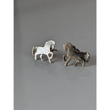 Silver steed running horse stud earrings with textured metallic finish and detailed silver horse stud design