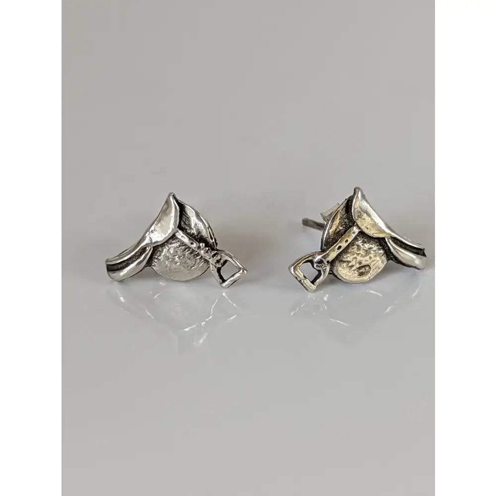 Silver steed silver saddle stud earrings with detailed craftsmanship and textured finish in silver material