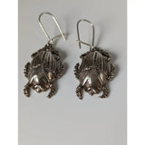 Silver steed scarab handcrafted silver earrings with detailed textured wings and legs in scarab dropped earrings style